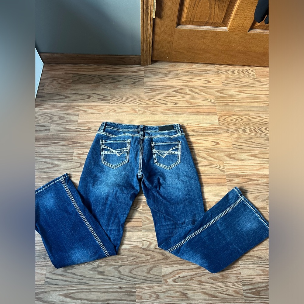 Low rise bootcut jeans worn twice